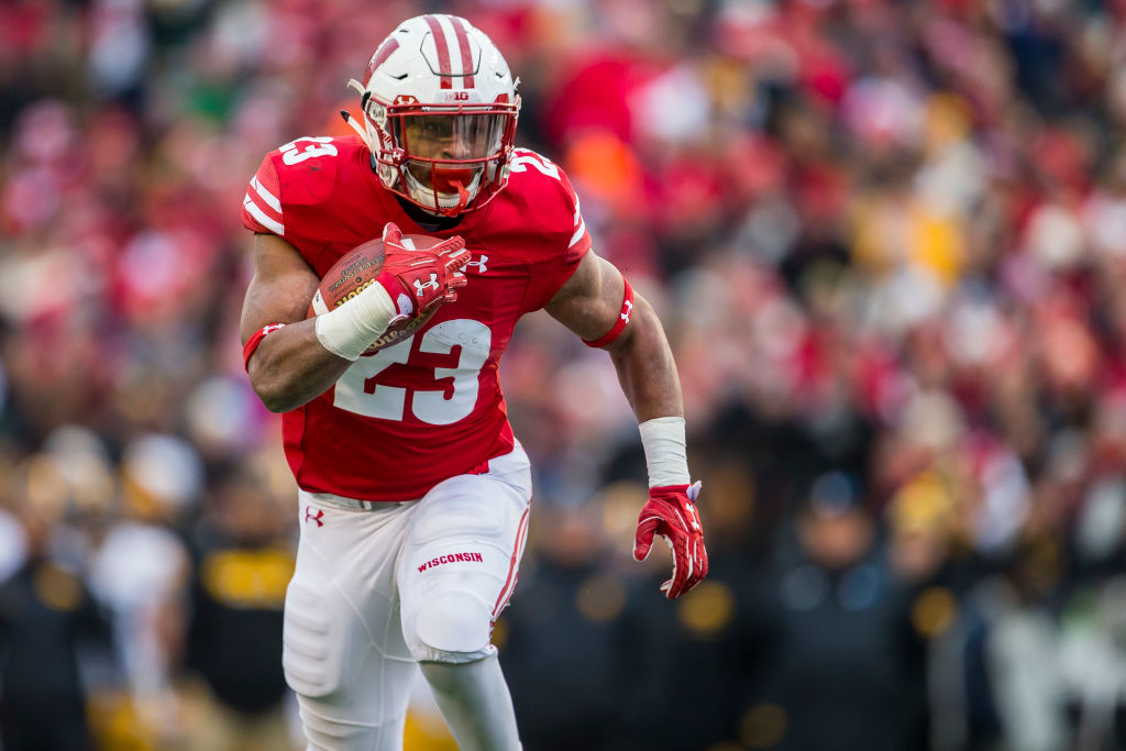 Wisconsin's Jonathan Taylor Broke Adrian Peterson's Freshman Rushing ...